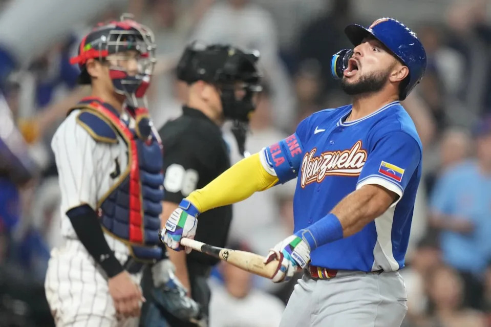Wilyer Abreu reacts after hitting a home run during Venezuela’s upset win over Japan on March 14. AP