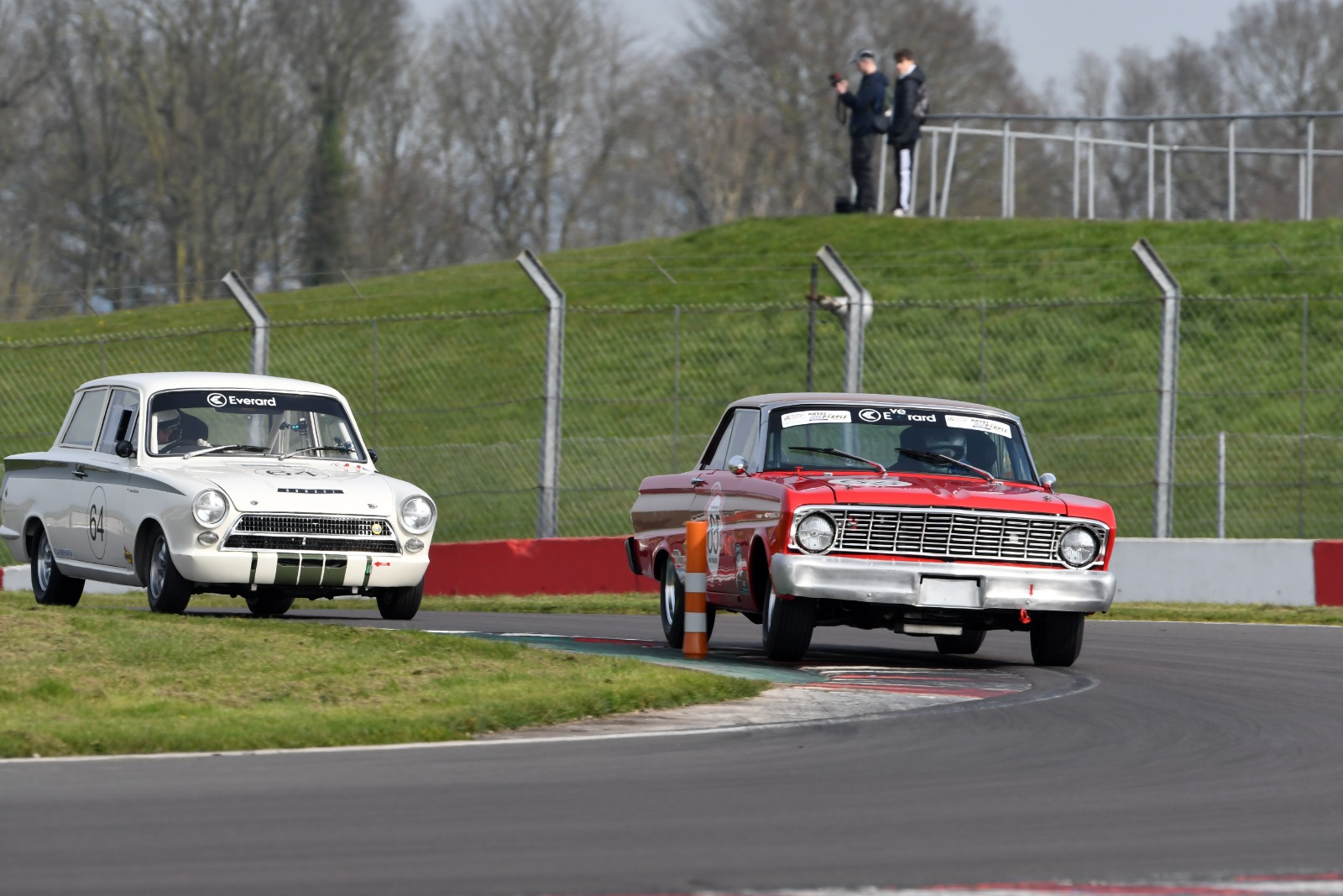 Ahead of the Minis, Piers Grange's Ford Falcon and Simon Gusterson's Cortina battled for the outright wins