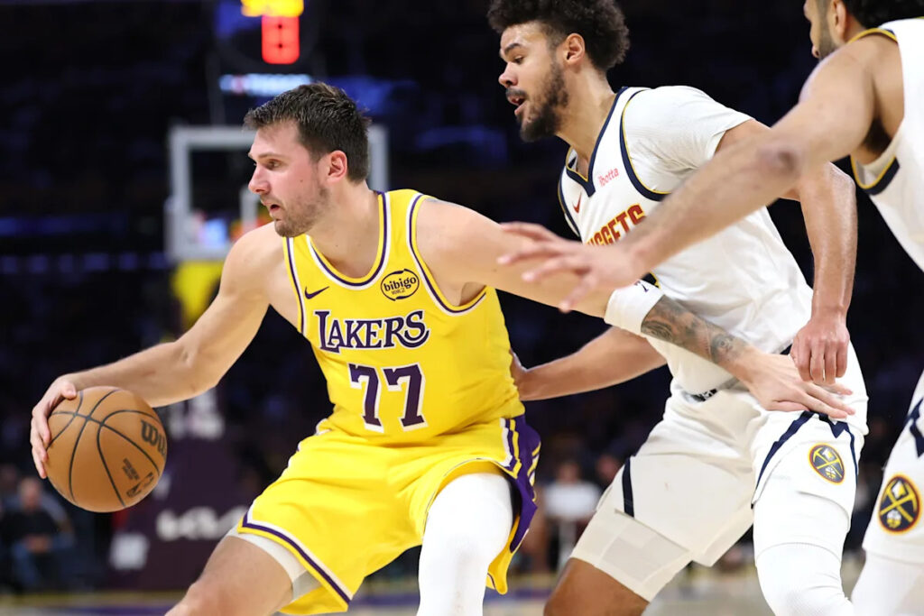 Luka Dončić hits wild fadeaway jumper to lead Lakers over Nuggets in overtime Luka Dončić hits wild fadeaway jumper to lead Lakers over Nuggets in overtime