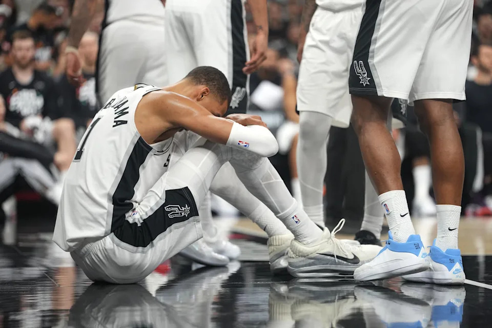 Victor Wembanyama reacts after falling to the ground during Game 2 against the Trail Blazers.