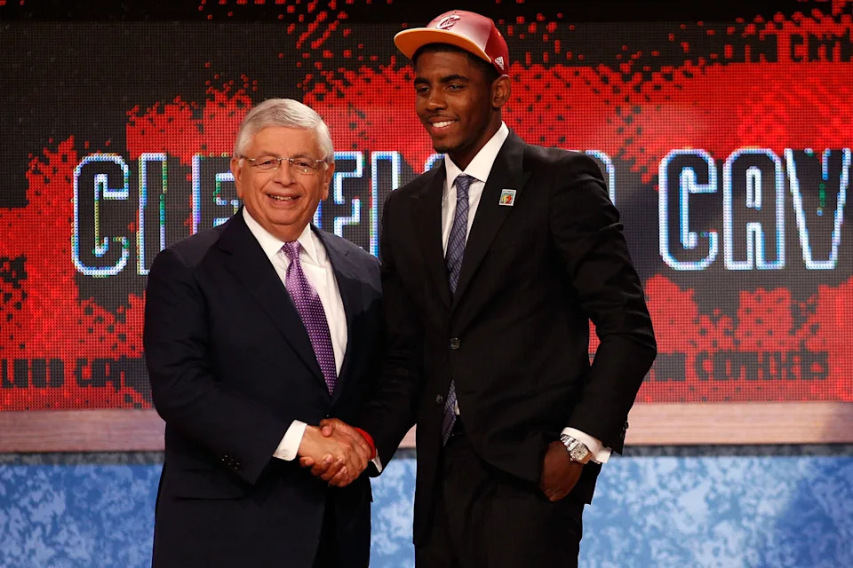 Kyrie Irving greets NBA commissioner David Stern after he was selected No. 1 overall by the Cleveland Cavaliers in the 2011 NBA Draft.