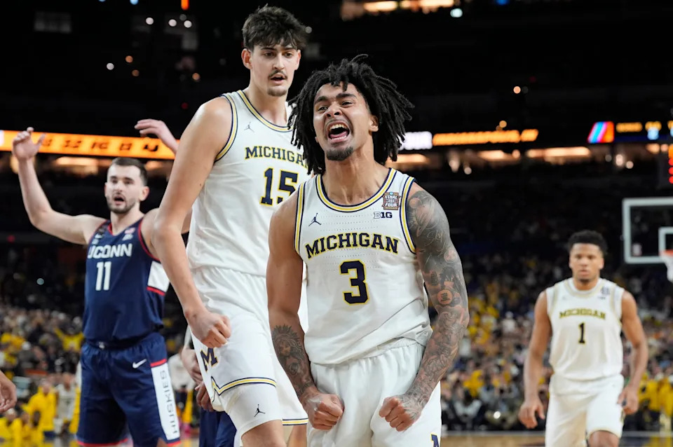 Michigan guard Elliot Cadeau celebrates a play during the first half of the NCAA national championship game against Connecticut at Lucas Oil Stadium in Indianapolis on Monday, April 6, 2026.