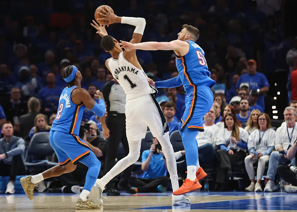 Victor Wembanyama shoots as the Oklahoma City Thunder's Isaiah Hartenstein defends during Game 2 of the Western Conference finals on May 20, 2026 at Paycom Center.