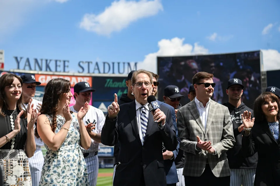 Longtime Yankee announcer John Sterling is honored during a pregame ceremony in recognition of his retirement before a game against the Toronto Blue Jays at Yankee Stadium on April 20, 2024.