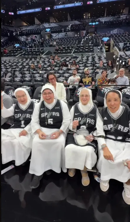 The Salesian Sisters yelling “Go Spurs Go” before Game 4 on Sunday.