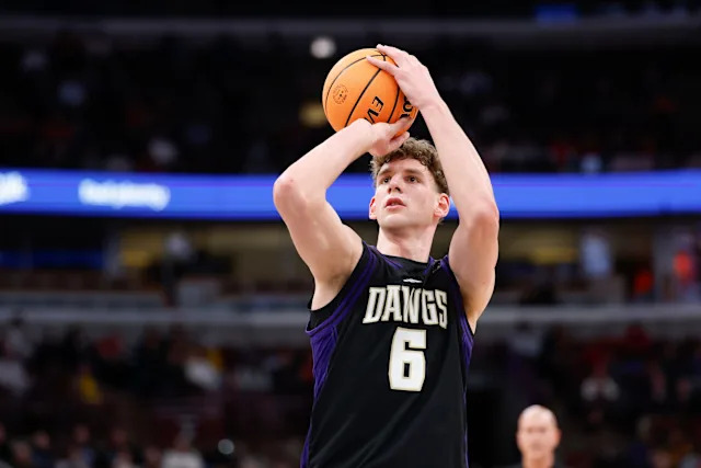 Washington Huskies forward Hannes Steinbach (6) shoots a free throw against the Wisconsin Badgers during the first half at United Center.