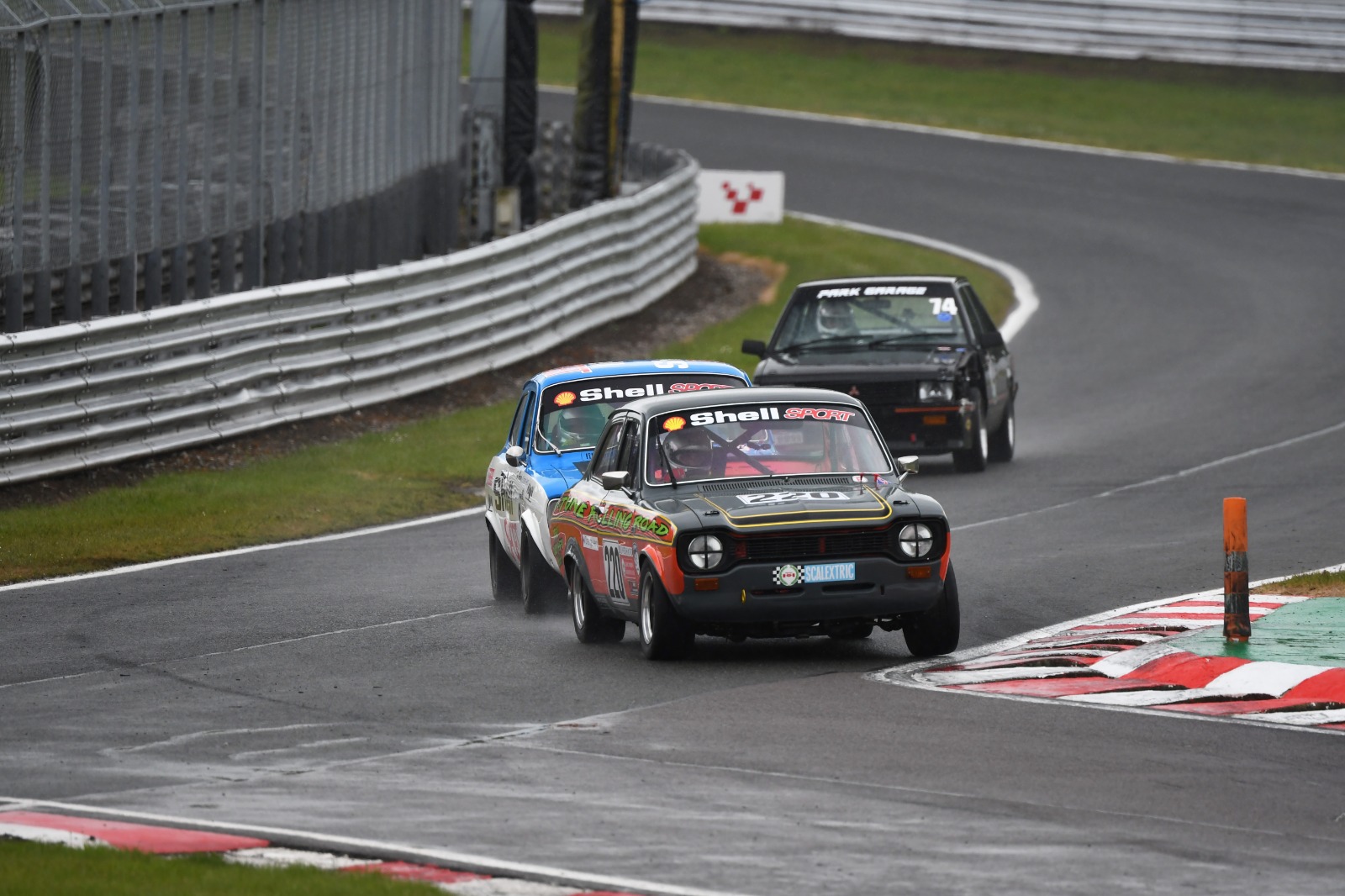 Nic Grindrod's Ford Escort ended up winning both Pre-'83 races