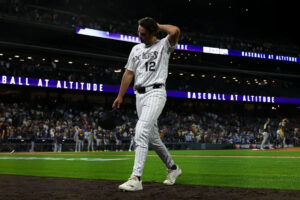 The Rockies hung around but the game got away late in a 7-1 loss to the Brewers