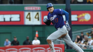 Ohtani homers, leaves game with left knee inflammation in Dodgers’ 8-6 win over Pirates