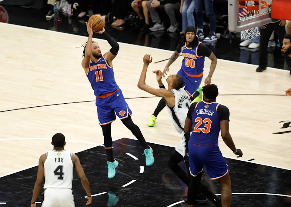 New York Knicks guard Jalen Brunson (11) puts up a shot over San Antonio Spurs forward <a class="link " href="https://sports.yahoo.com/nba/players/10094/" data-i13n="sec:content-canvas;subsec:anchor_text;elm:context_link" data-ylk="slk:Victor Wembanyama;sec:content-canvas;subsec:anchor_text;elm:context_link;itc:0" data-yga="{"yLinkElement":"context_link","yModuleName":"content-canvas","yLinkText":"Victor Wembanyama","ySubModuleName":"anchor_text","yHasCommerce":false}">Victor Wembanyama</a> (1) during the third quarter of game 5 of the 2026 NBA Finals. Jason Szenes for the New York Post