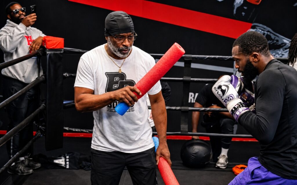 Bozy Ennis Reflects On His Fighters, Influences, And Boots’ Title Fight With Xander Zayas Bozy Ennis Reflects On His Fighters, Influences, And Boots’ Title Fight With Xander Zayas