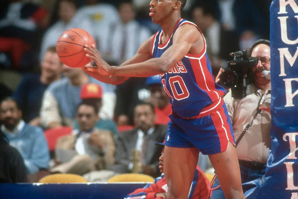 LANDOVER, MD – CIRCA 1992: Dennis Rodman #10 of the <a class="link " href="https://sports.yahoo.com/nba/teams/detroit/" data-i13n="sec:content-canvas;subsec:anchor_text;elm:context_link" data-ylk="slk:Detroit Pistons;sec:content-canvas;subsec:anchor_text;elm:context_link;itc:0" data-yga="{"yLinkElement":"context_link","yModuleName":"content-canvas","yLinkText":"Detroit Pistons","ySubModuleName":"anchor_text","yHasCommerce":false}">Detroit Pistons</a> passes the ball in bounds against the Washington Bullets during an NBA basketball game circa 1992 at the Capital Centre in Landover, Maryland. Rodman played for the Pistons from 1986-93. (Photo by Focus on Sport/Getty Images) | Getty Images