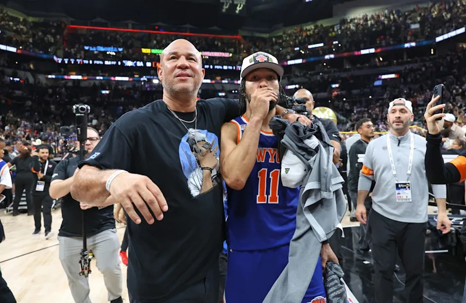 Jalen Brunson #11, with his dad Rick Brunson, after the Knicks defeated the Spurs to win the NBA Championship. Charles Wenzelberg / New York Post