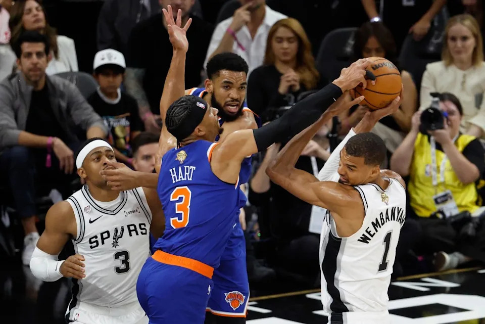 New York Knicks guard Josh Hart knocks the ball away from San Antonio Spurs forward Victor Wembanyama in the first half at Frost Bank Center during Game 2. Jason Szenes for The New York Post