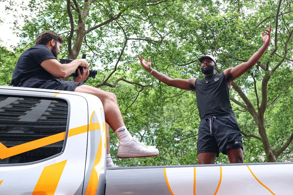 Mitchell Robinson celebrates during the Knicks championship ticker tape parade. IMAGN IMAGES via Reuters Connect