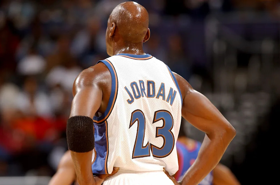 WASHINGTON, DC - DECEMBER 13: Michael Jordan #23 of the Washington Wizards plays against the New York Knicks at the MCI Center on December 13, 2001 in Washington, DC. NOTE TO USER: User expressly acknowledges and agrees that, by downloading and or using this photograph, User is consenting to the terms and conditions of the Getty Images License Agreement. (Photo by G Fiume/Getty Images)