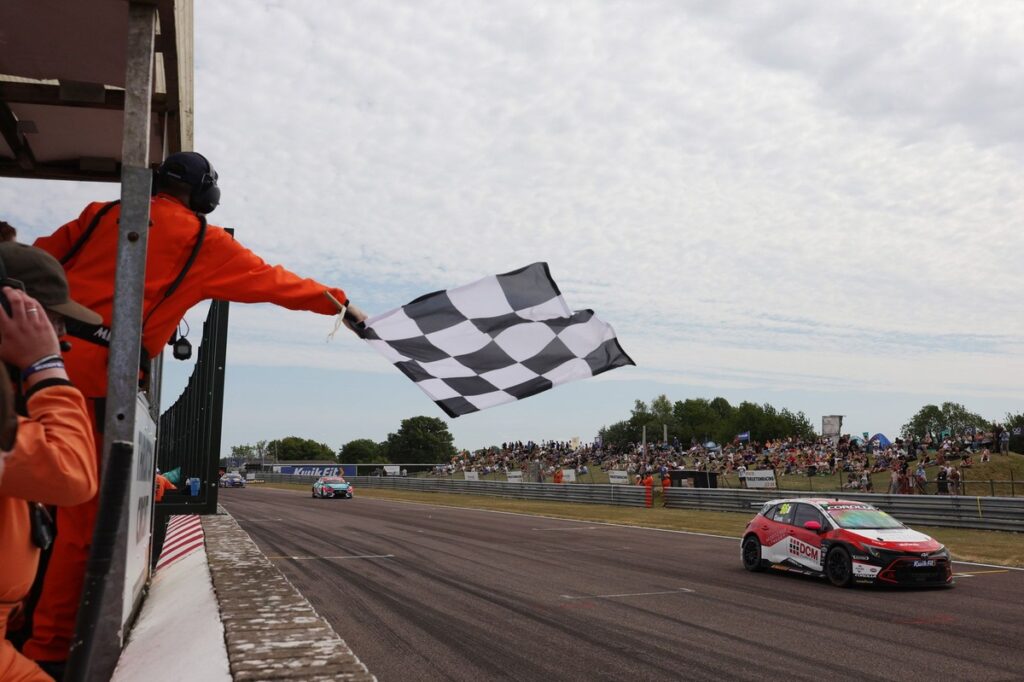 Cook holds off Sutton for opener win