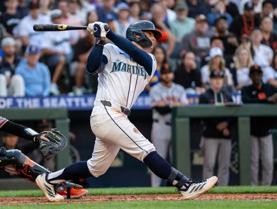 Cole Young belts a three-run homer in the seventh inning of the Mariners’ comeback win over the Giants. Stephen Brashear-Imagn Images