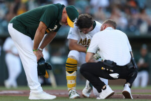 Athletics’ 1B Nick Kurtz leaves early after being hit in wrist by pitch in game vs. Red Sox