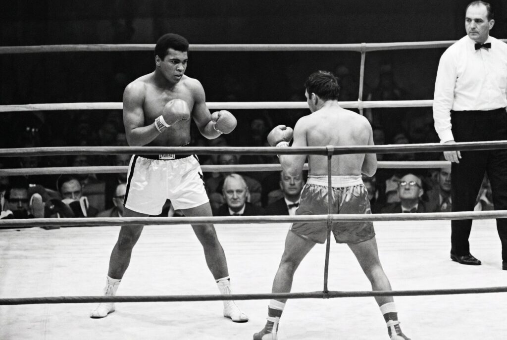 Cassius Clay Dominates Brian London In Three-Round Title Defense Cassius Clay Dominates Brian London In Three-Round Title Defense