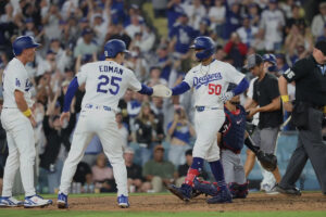 Dodgers storm their way back to sweep Nationals Dodgers storm their way back to sweep Nationals
